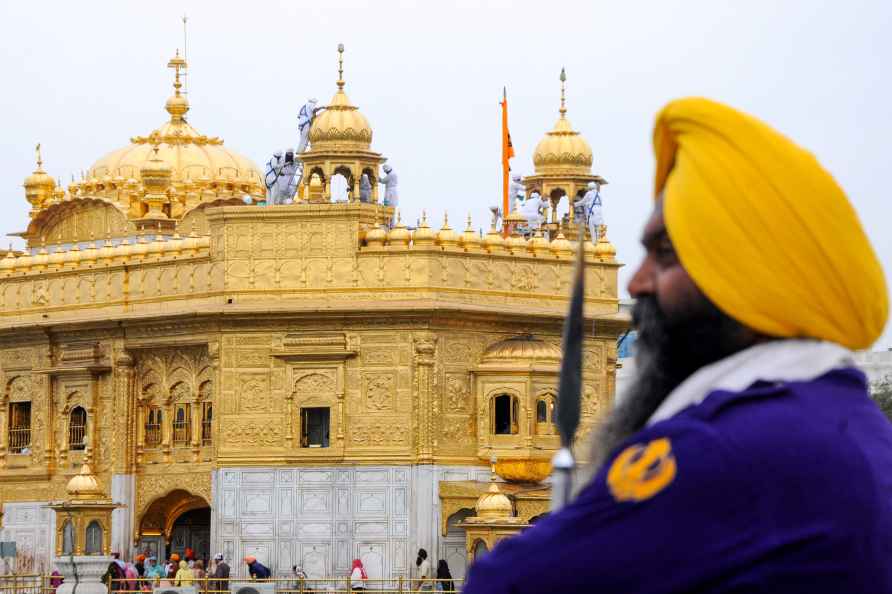 Cleaning at Golden Temple