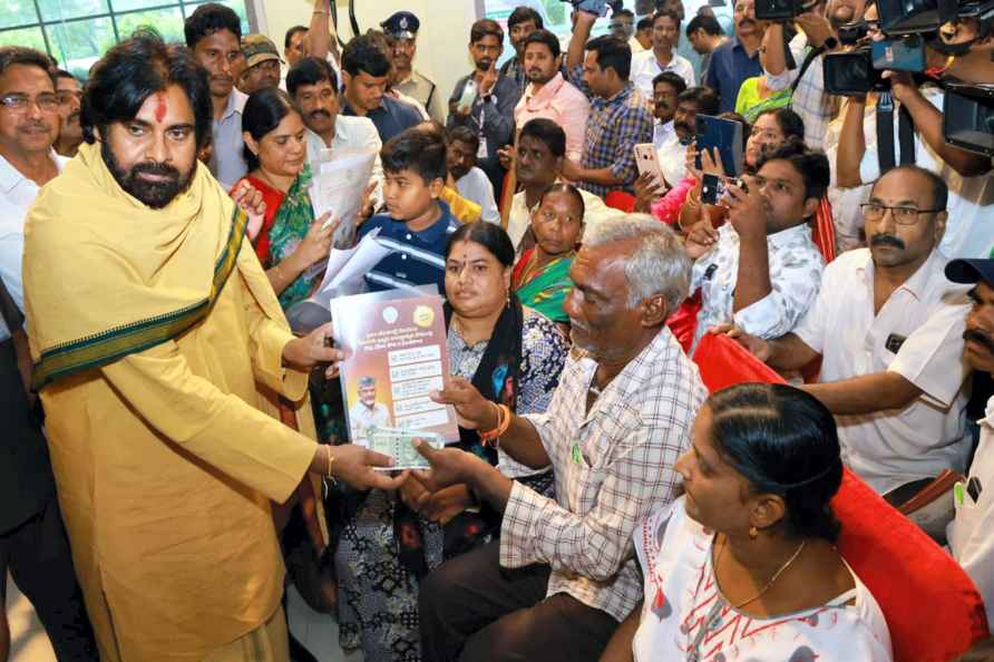 Pawan Kalyan distributes pension during an event