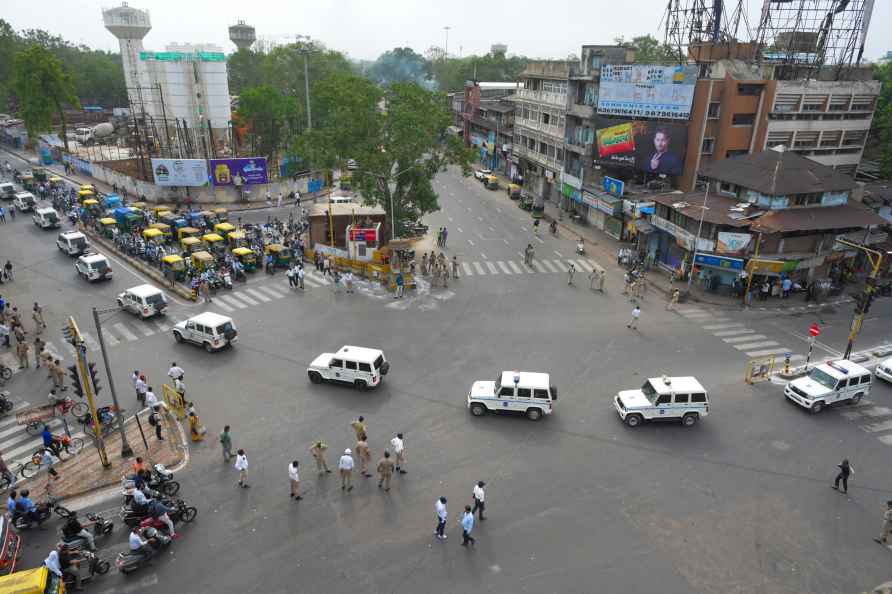 Ahmedabad: Police vehicles patrol on the route which is to be taken...