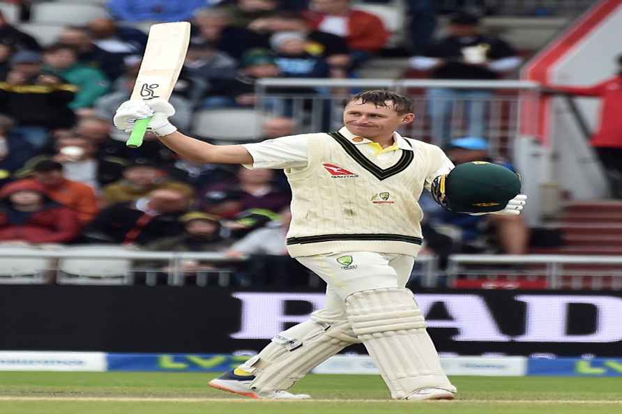 Australia's Marnus Labuschagne celebrates after scoring a century...