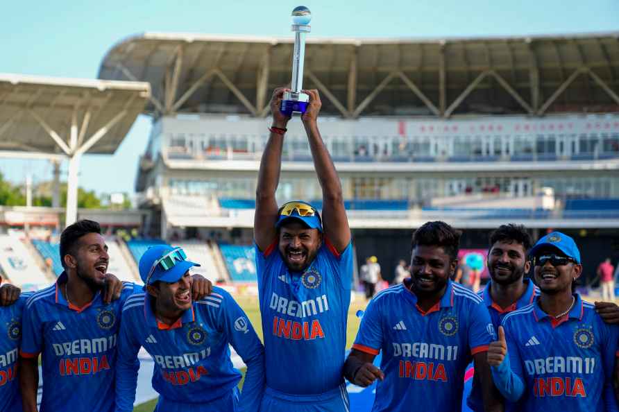 India's Mukesh Kumar hoist the trophy after India defeated West ...