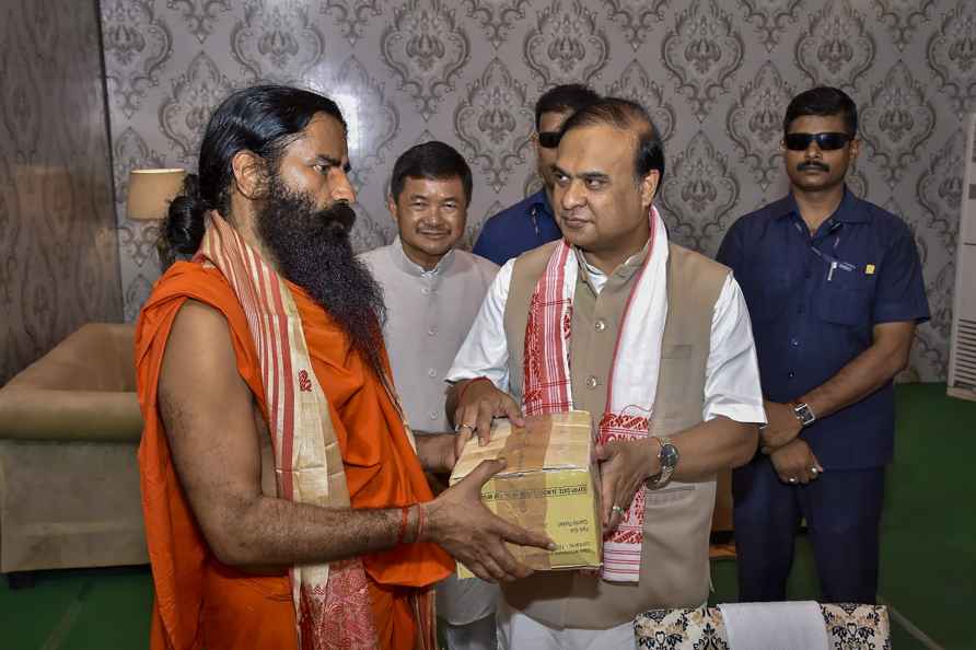 Ramdev and Assam CM at an event