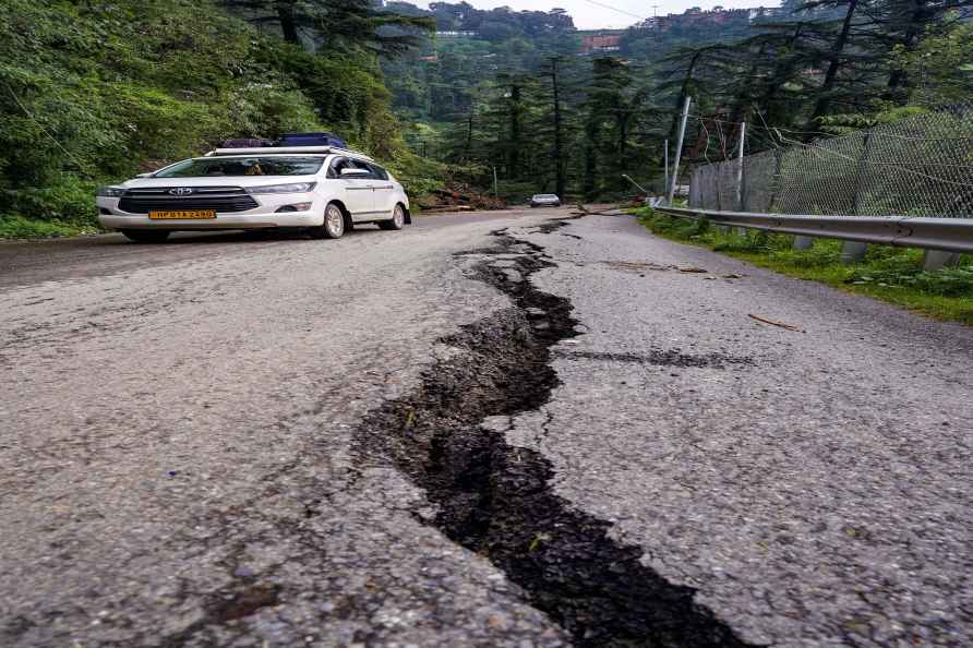 Weather: Cracks on road after rainfall