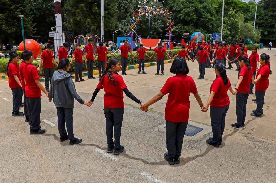 Bengaluru: Students stand under the sun casting negligible shadows...