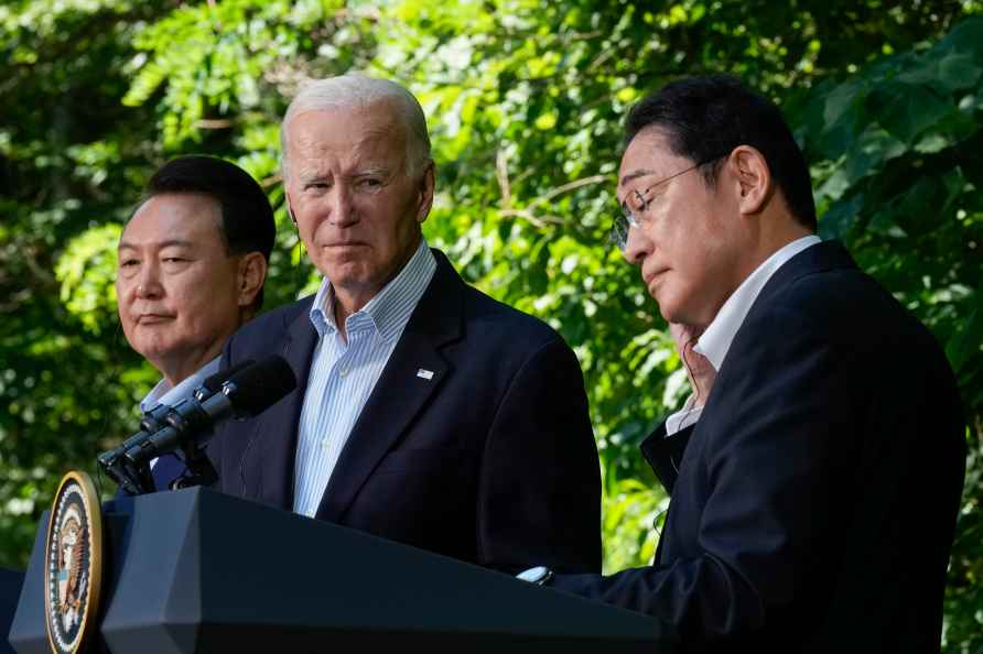 Joe Biden, Fumio Kishida and Yoon Suk Yeol