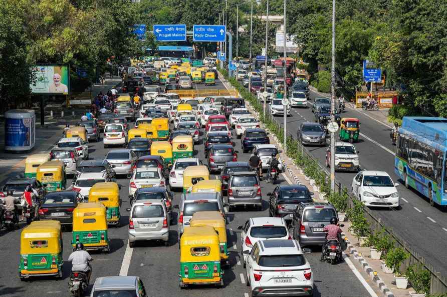 New Delhi: Vehicles move in slow pace during traffic jam, in New...