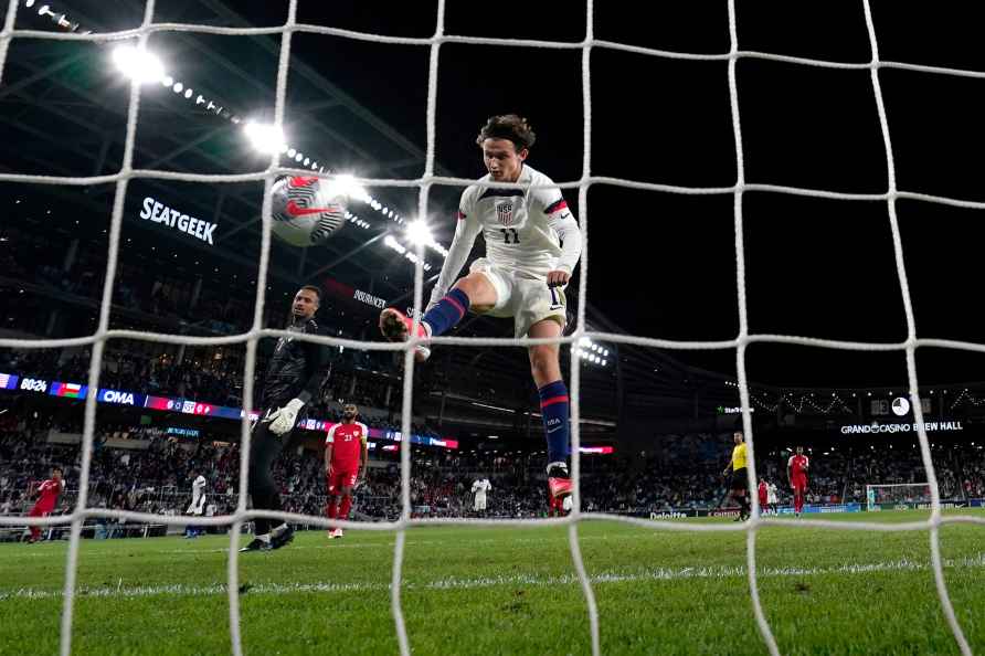 United States' Brenden Aaronson (11) celebrates in the goal after...