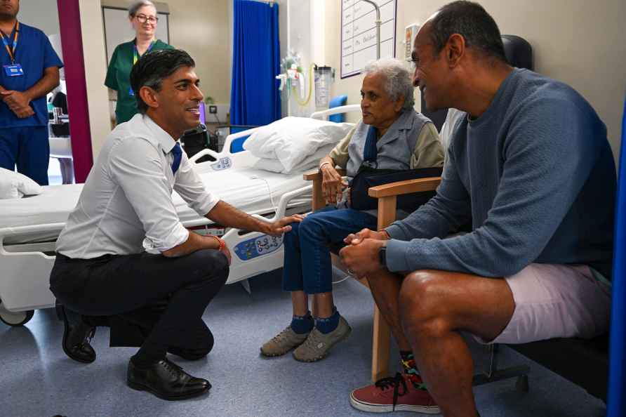 Britain's Prime Minister Rishi Sunak meets patient Patel in the ...