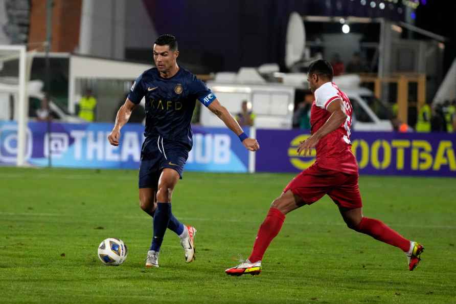 Saudi Arabia's Al Nassr Cristiano Ronaldo plays with the ball against...