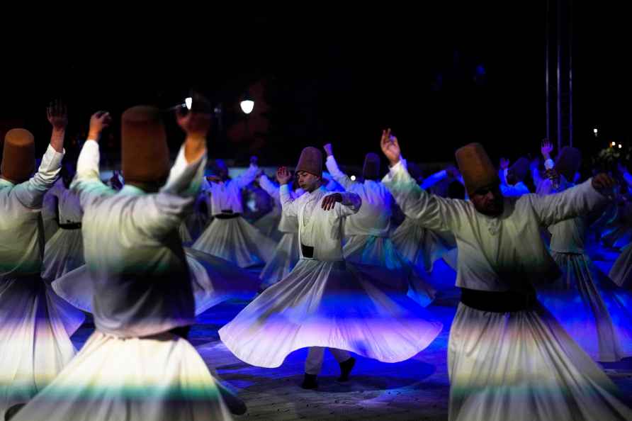 Whirling dervishes perform