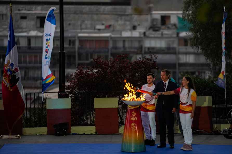 Left to right, Chilean athlete Tomas Gonzalez, president of Panam...