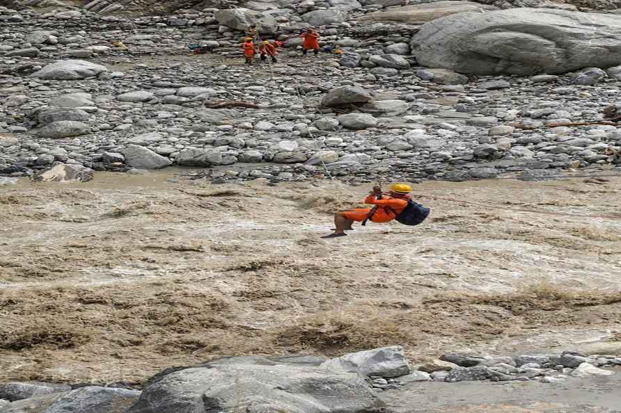 Chungthang: NDRF personnel carry out rescue work in flood affected...