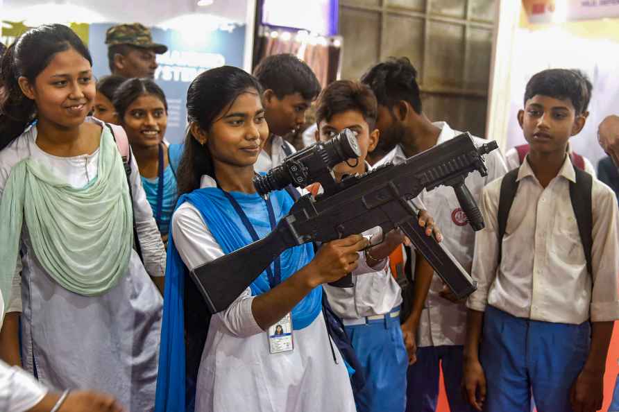 Guwahati: Students hold a weapon on display at a stall during 'East...