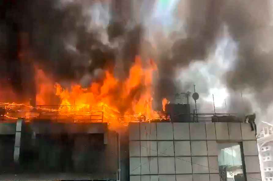 **EDS: VIDEO GRAB** Bengaluru: Smoke and flames rise after a fire...