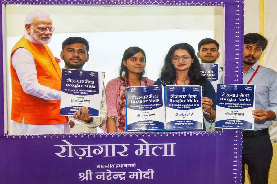 Patna: Candidates pose for photos with their appointment letters...