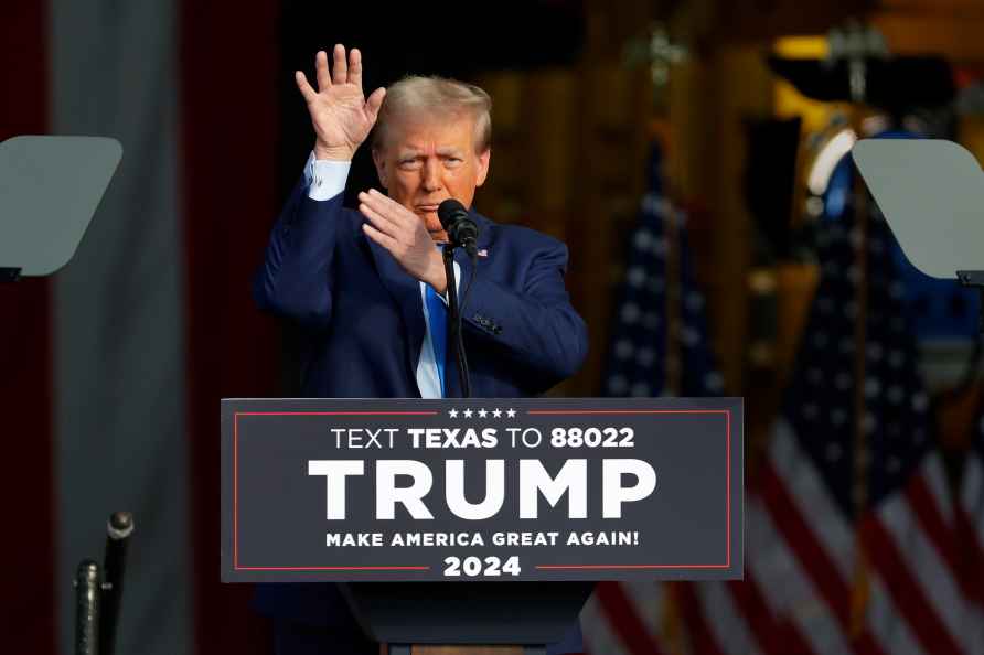 Former President Donald Trump gestures as he gives remarks during...