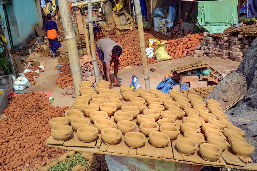 Earthen lamps being dried for Diwali festival