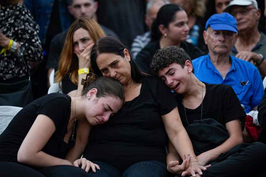 Family members of Sgt. Roni Eshel cry