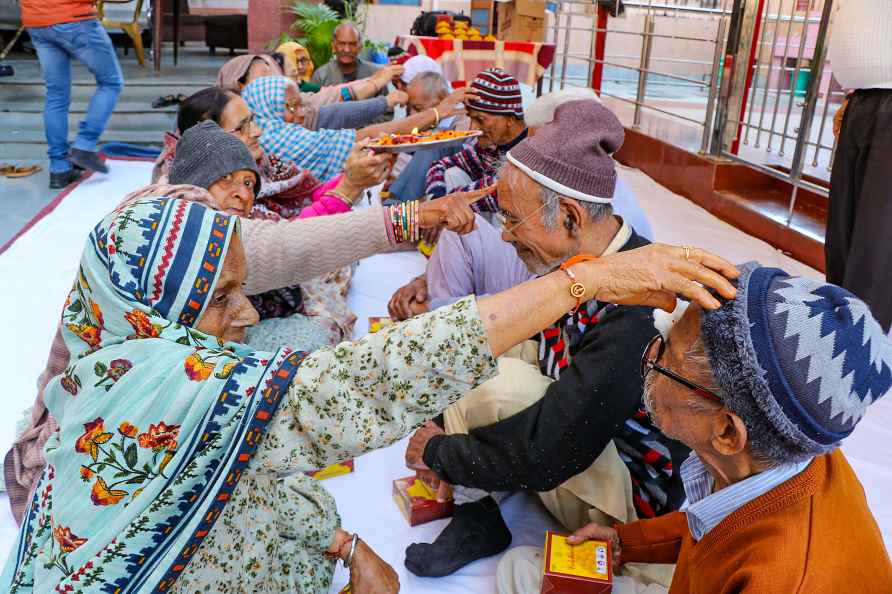 Jammu: Elderly people at an old age home celebrate 'Bhai Dooj' festival...