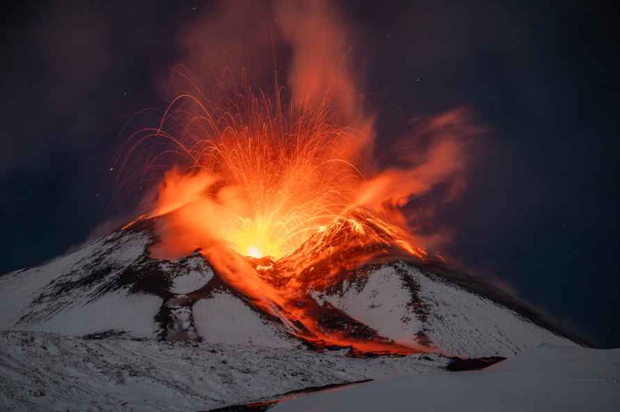 Lava erupts from snow-covered Mt Etna volcano, Sicily