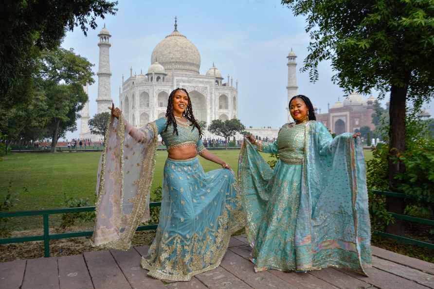 Agra: Foreign tourists in traditional Indian 'lehenga' pose for ...