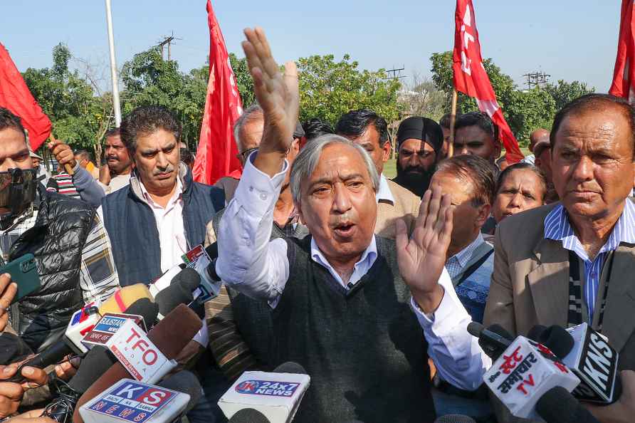 Yousuf Tarigami with workers during protest