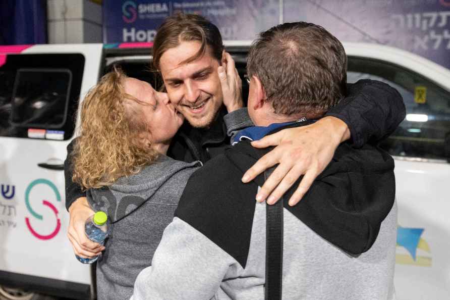 This photo released by the GPO, Ron Krivoi meets his parents at ...