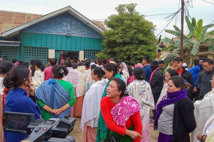 Imphal: Family members and relatives gather after bodies of 13 people...