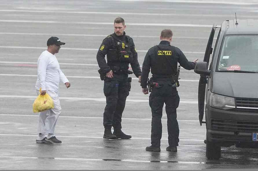 Danish police officers accompany financier Sanjay Shah