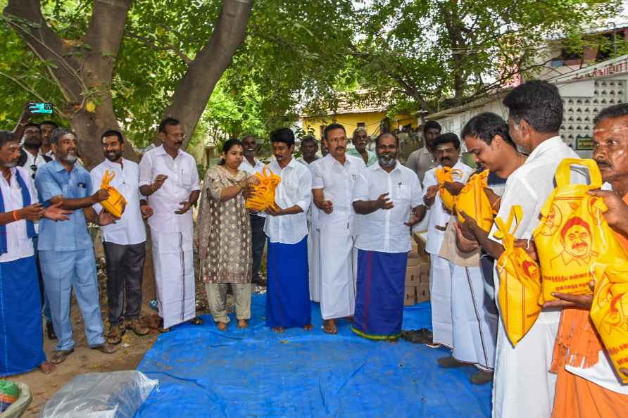 Distribution of flood relief materials in Madurai