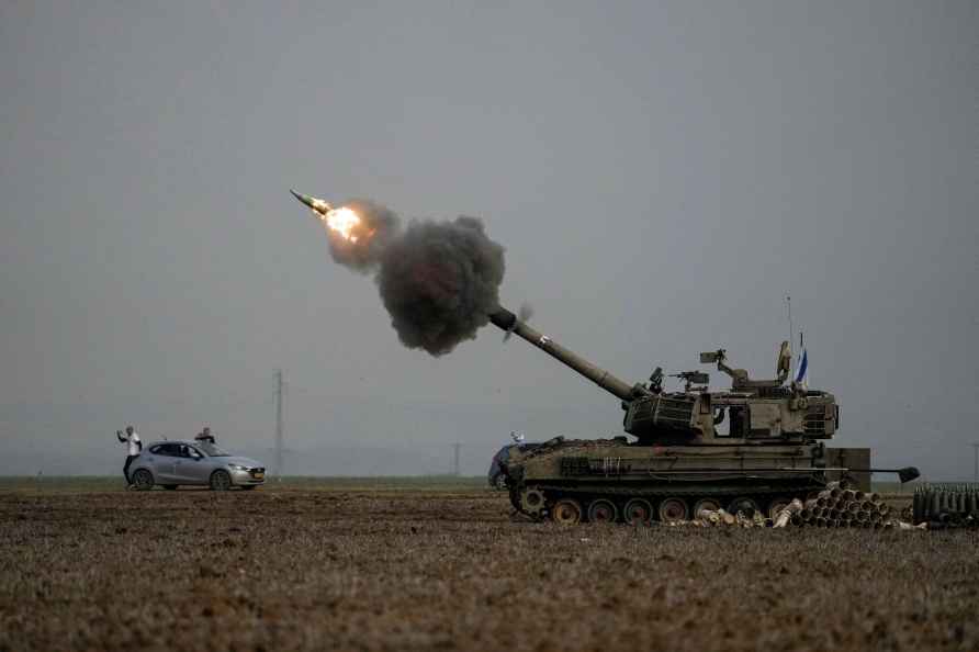 Israeli mobile artillery unit fires a shell