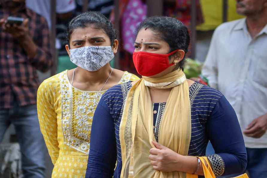 Bengaluru: People wearing face masks as a precautionary measure ...