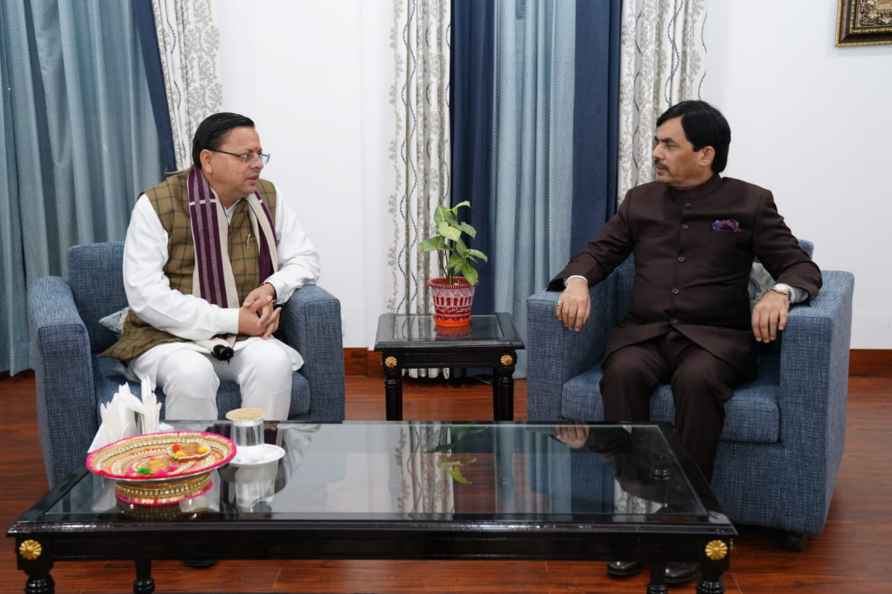 CM Dhami meets Syed Shahnawaz Hussain