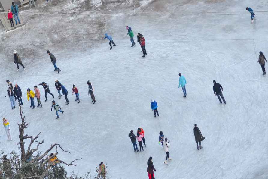 Shimla: Tourists participate in the ice skating, at Lakkar Bazar...