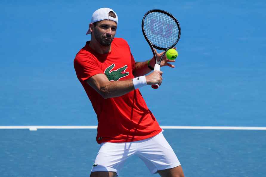 Bulgaria's Grigor Dimitrov plays a backhand return during a practice...