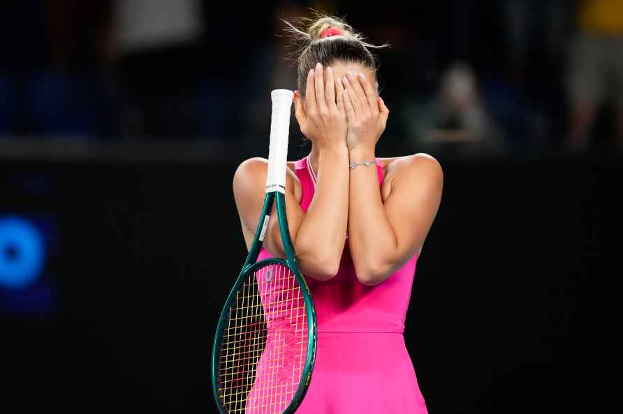 Marta Kostyuk of Ukraine celebrates after defeating Elise Mertens...