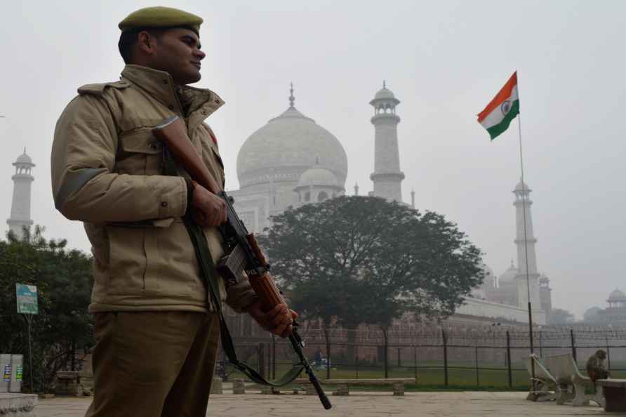 Agra: A PAC jawan guards near the Taj Mahal ahead of the Republic...