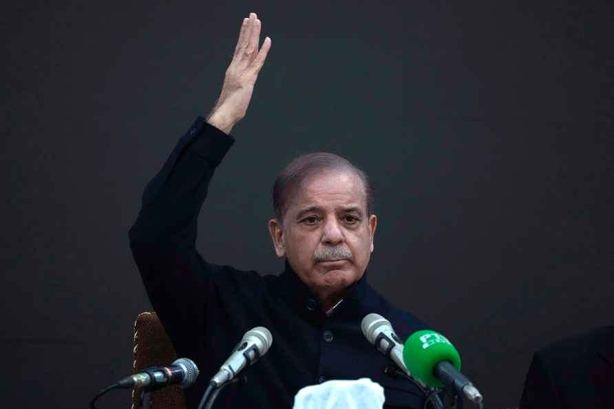 Pakistan's former Prime Minister Shehbaz Sharif gestures during ...