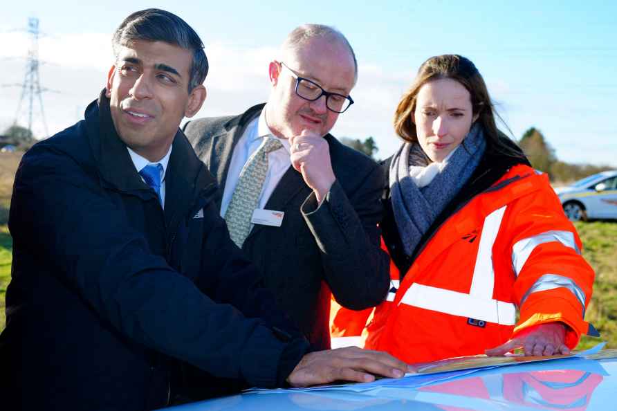 Britain's Prime Minister Rishi Sunak, left, Andrew Haines, Chief...