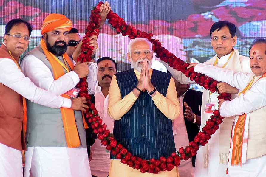 West Champaran: Prime Minister Narendra Modi being garlanded during...