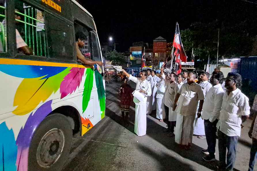 Puducherry: AIADMK workers distribute flyers regarding the call ...