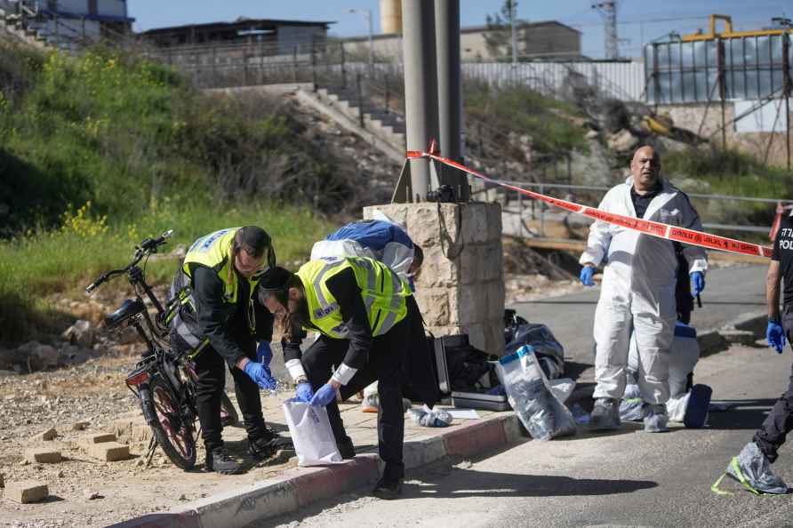 Israeli security forces inspect the scene of a stabbing attack