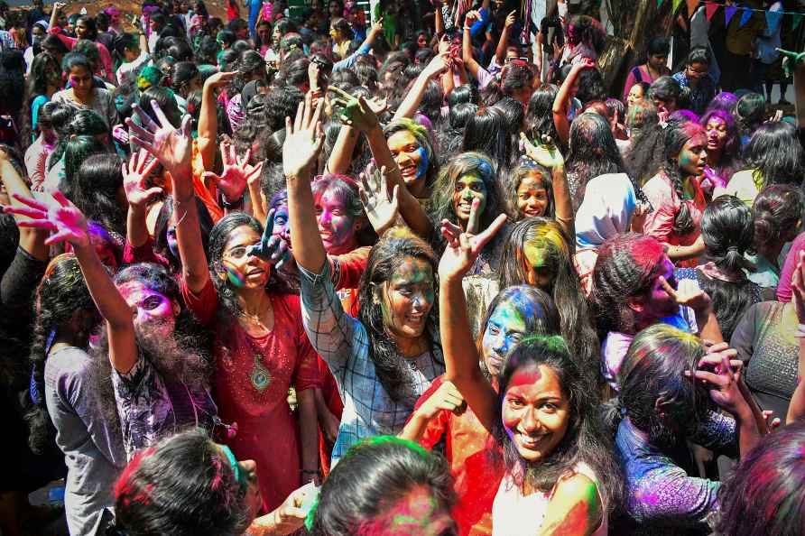 Thiruvananthapuram: Youngsters play with colours during Holi celebrations...