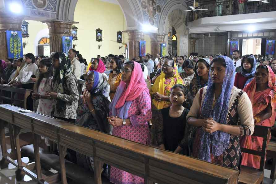 Dehradun: Devotees offer prayers at the St. Francis Assisi Church...