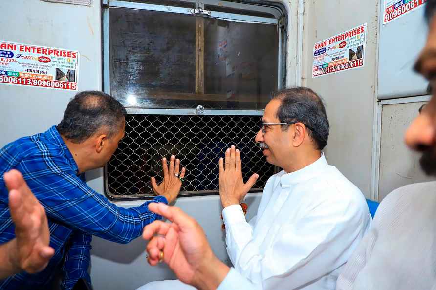 Uddhav Thackeray travels by train