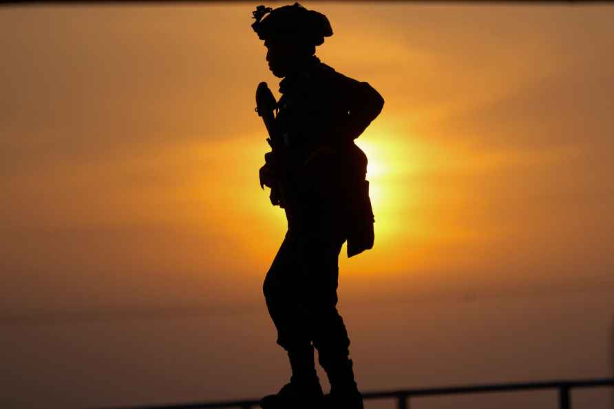 Thai soldier patrol the Moei river