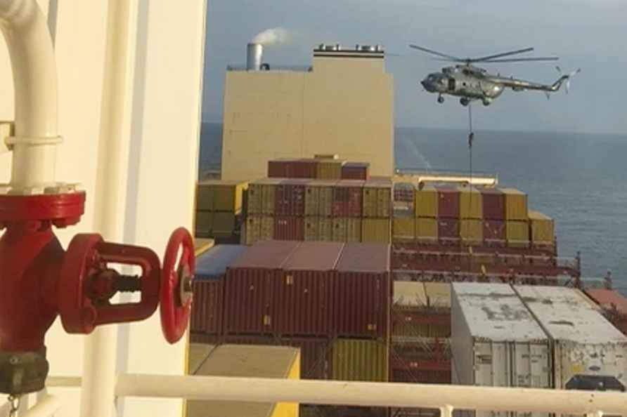 Commandos raiding a ship near the Strait of Hormuz by helicopter