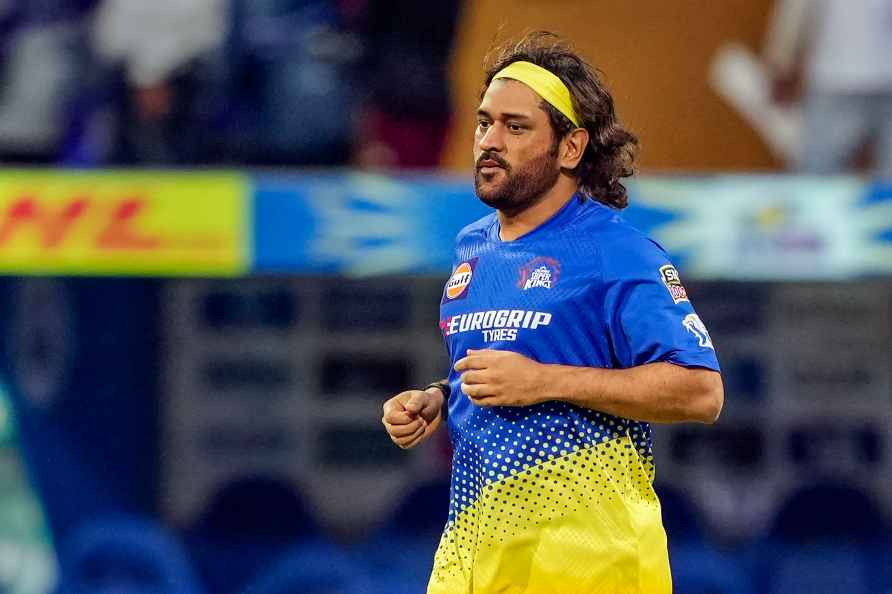 Mumbai: Chennai Super Kings player M.S. Dhoni warms up before the...