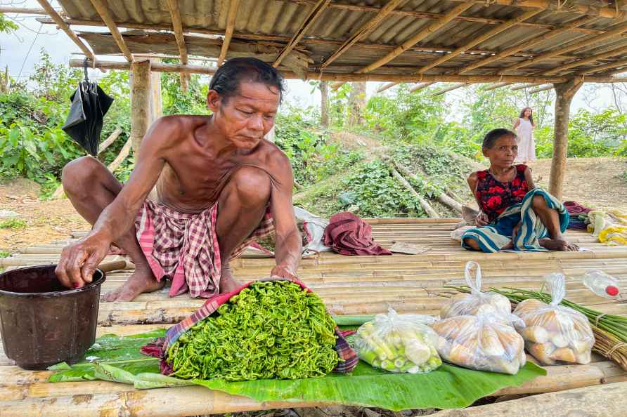 Tribal man sells vegetables in Khowai