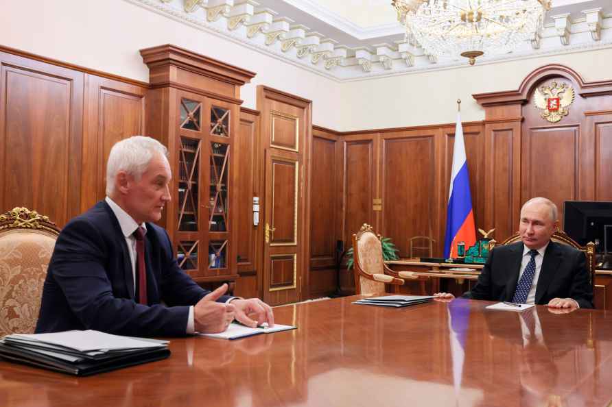 Russian President Vladimir Putin, right, listens to First Deputy...